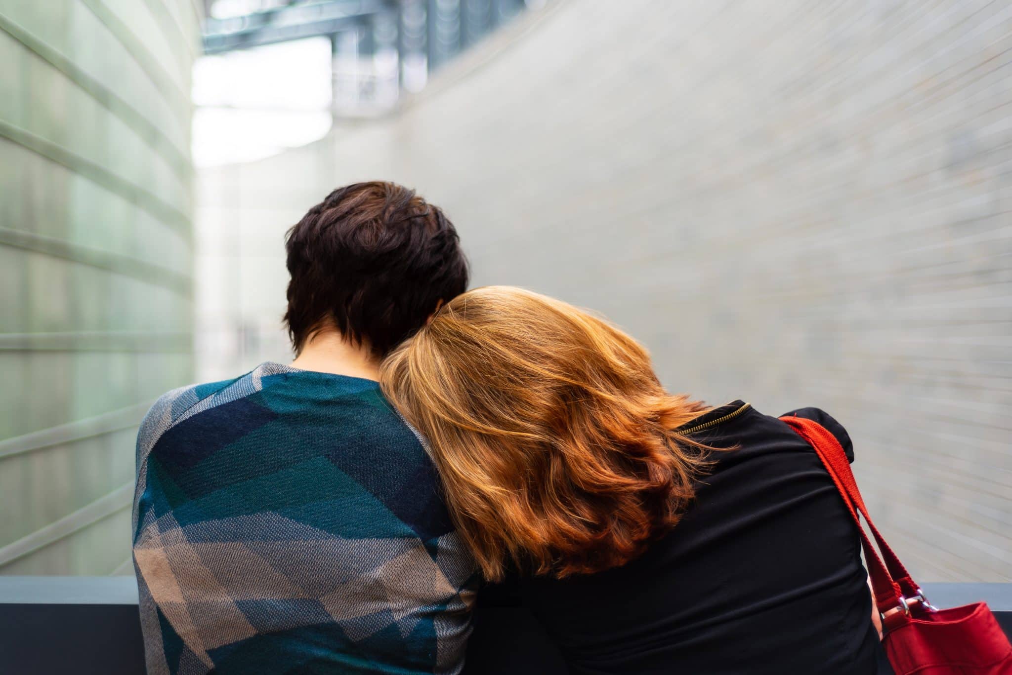 Person giving support to a loved one in a rehab centr during their recovery