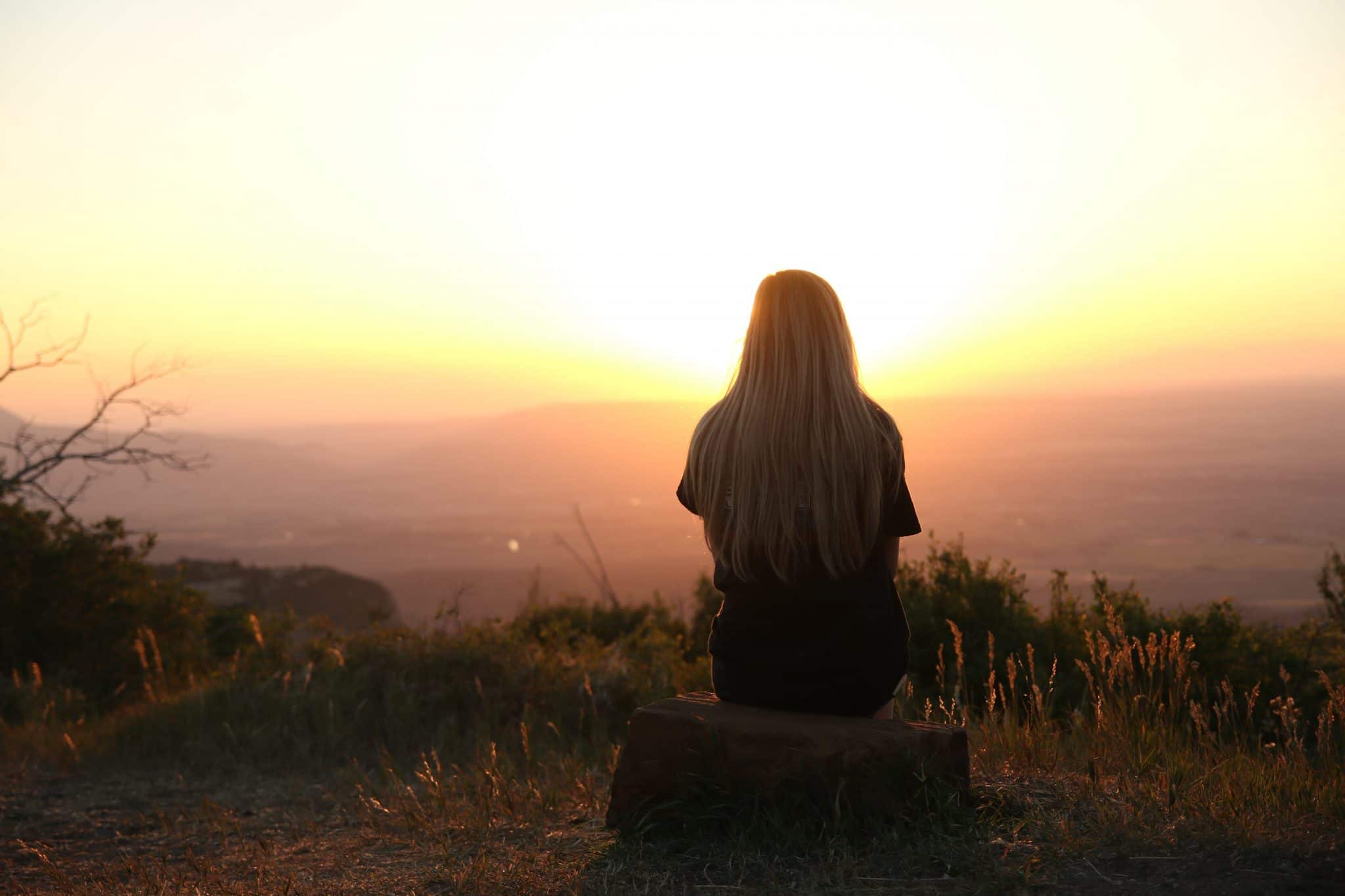 woman watching sunset discovering addictions in the home can be hard, but new leaf project are here to help