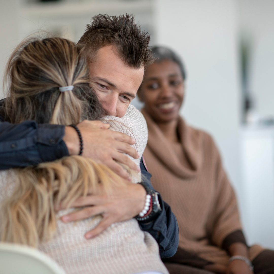 drug-addiction-retreat-birmingham Two clients embracing at drug addiction retreat in the West Midlands New Leaf Recovery
