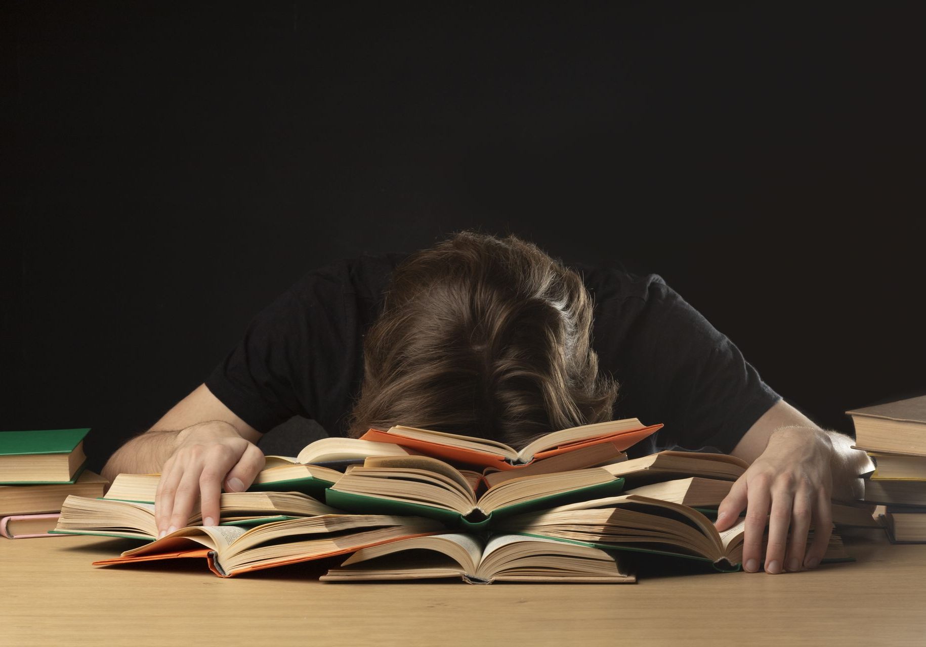 Academic Stress & Substance Abuse - head in books